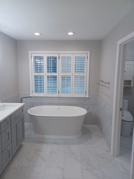 Remodeled bathroom by Erix Home Improvement LLC